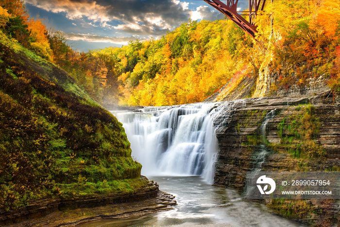 Letchworth State Park, NY. A beautiful Autumn day in October in Upstate NY. Waterfalls and Train Trestle Bridge on the Genesee River.