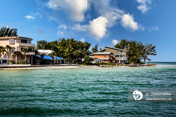 Waterfront homes on the shoreline of Anna Maria Island city overlooking the Gulf of Mexico in Florida