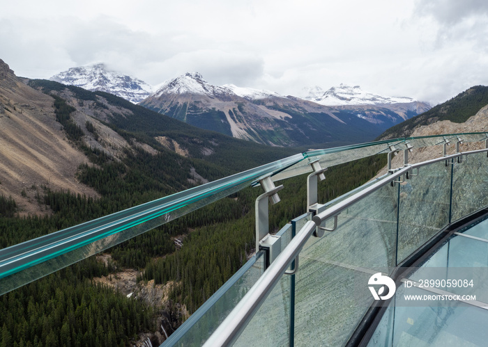 glass bridge high in the mountains on a cloudy day