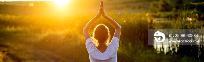 woman in a yoga pose at sunset by lakeside mindfulness and mental health