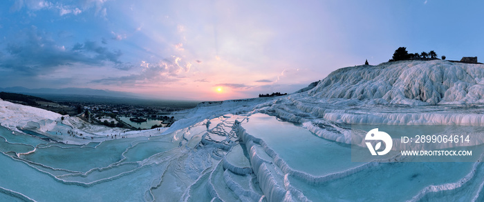 Pamukkale Travertines Cinematic Aerial Drone footage. Turkish famous white thermal bath with healthy clean water in a beautiful sunset.