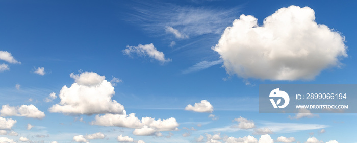 Natural beautiful abstract scenic azure blue sky with white cumulus clouds background on bright sunny summer day. Nature cloudscape tranquil landscape scene backdrop pattern