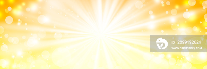 黄色のキラキラ背景（放射線状の光）