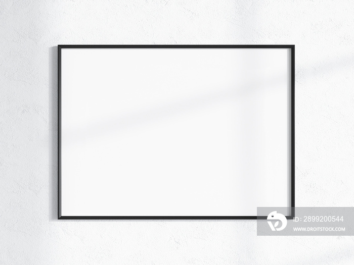 horizontal black frame mockup on the wall