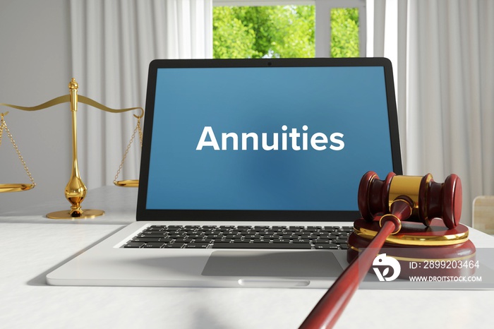 Annuities – Law, Judgment, Web. Laptop in the office with term on the screen. Hammer, Libra, Lawyer.