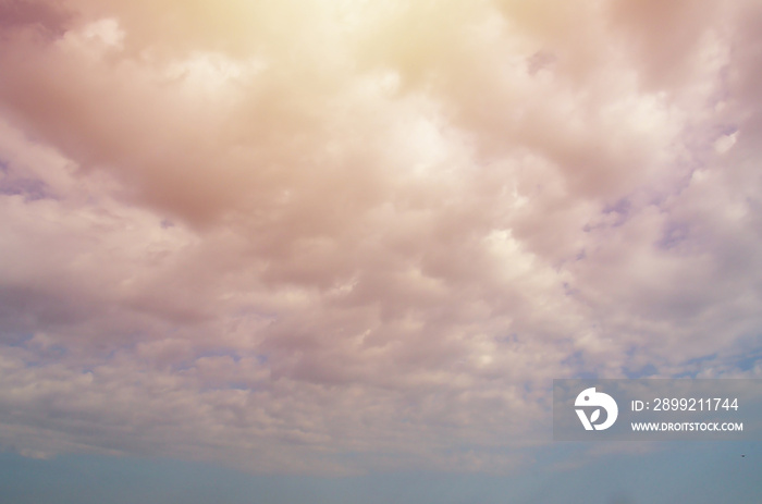 Blue sky background with white fluffy clouds in daytime outdoors. Skybox texture or banner