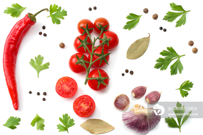 cherry tomato, red hot chili pepper, garlic and spices isolated on white background. top view