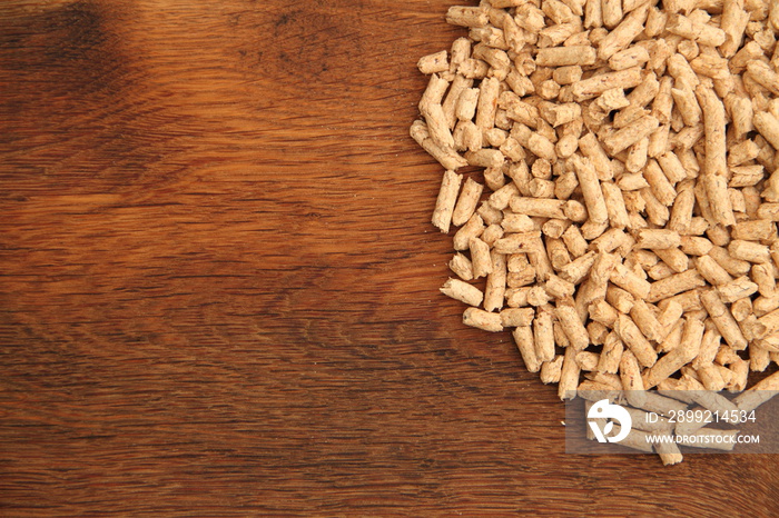 an old oak board with wood pellets