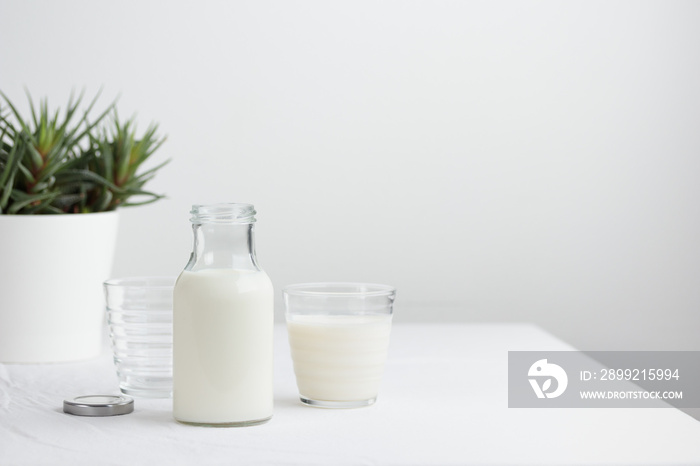 Fresh Milk on the table with white tablecloth