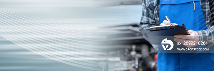 Car mechanic checking a car engine; panoramic banner