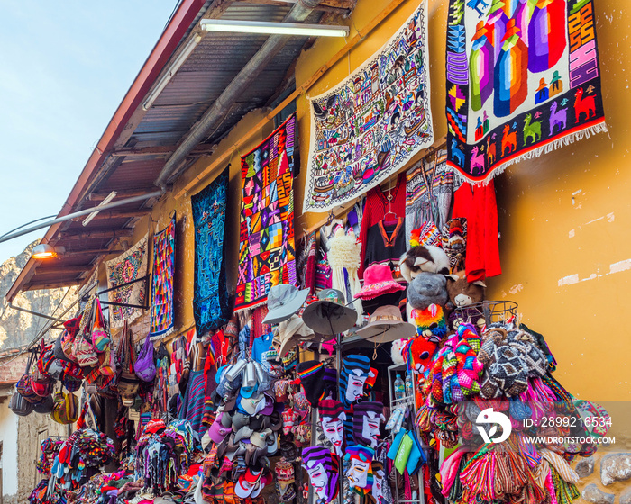 Colourful goods for sale in souvenir shop, Ollantaytambo, Peru.