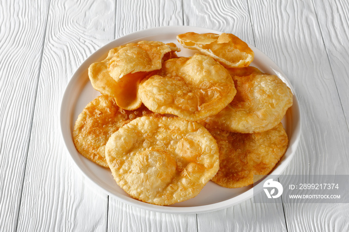 close-up of hot Bhatura on a white plate