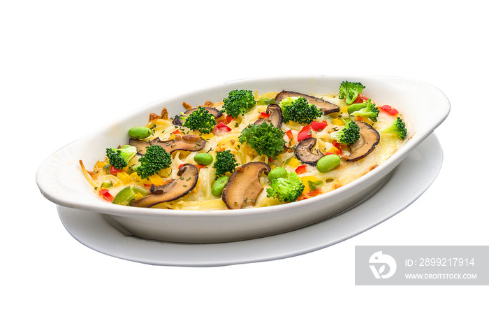 Broccoli Bits Cream Baked Pasta served in a dish isolated on plain white background side view