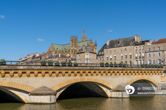 the Moselle River and Moyen Bridge with the historic city center of Metz behind