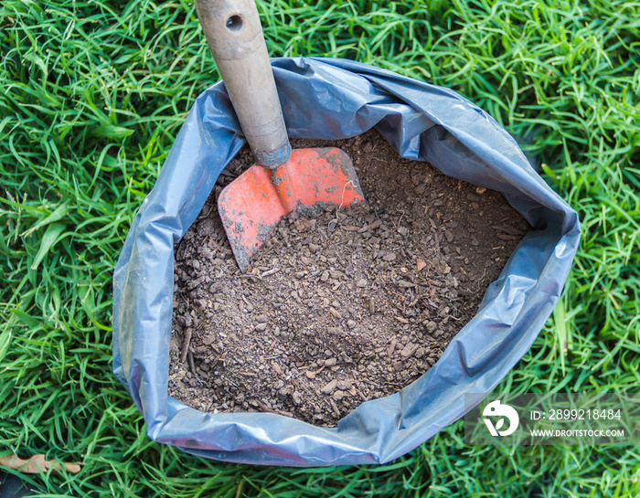 top view of a bag with fertile soil for the garden