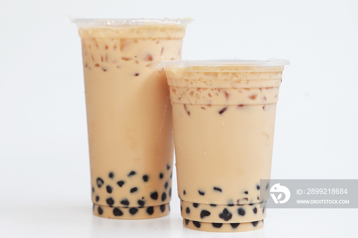 Two cups big and small Iced milk tea with boba bubble Taiwan Style on white backgrond, Isolated fresh ice sweet drink