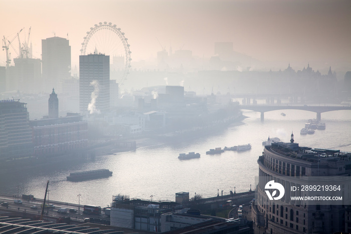 rooftop view over London on a foggy day from St Paul’s cathedral, UK