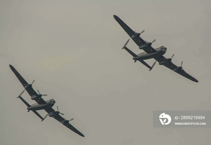 The last two remaining airworthy Avro Lancasters heavy bombers performing a duet in the skies