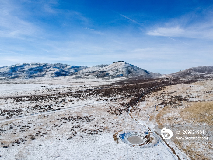 Snow dusted plains from above