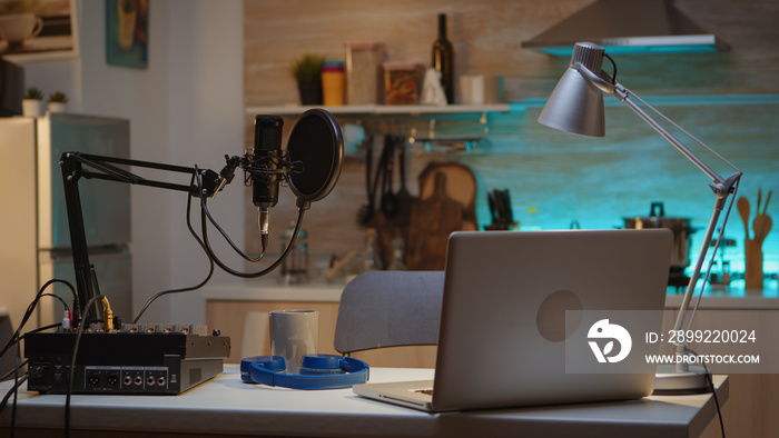 Professional setup for recording podcast in home studio of vlogger. Influencer recording social media content with production microphone. Digital web internet streaming station