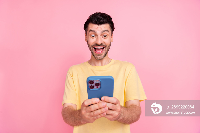 Photo of cheerful man blogger make instagram twitter video story streaming chatting followers subscribers isolated on pink color background