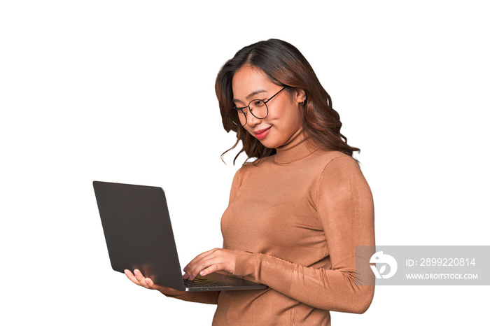 A young asian woman working with her laptop