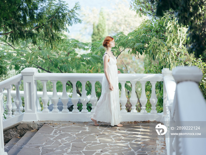 Woman in white dress greece fashion posing charm princess