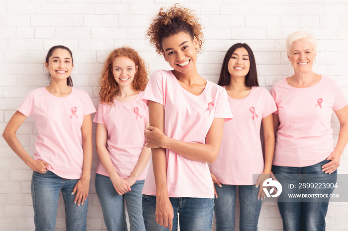 African Girl Standing With Breast Cancer Volunteers Group, White Background