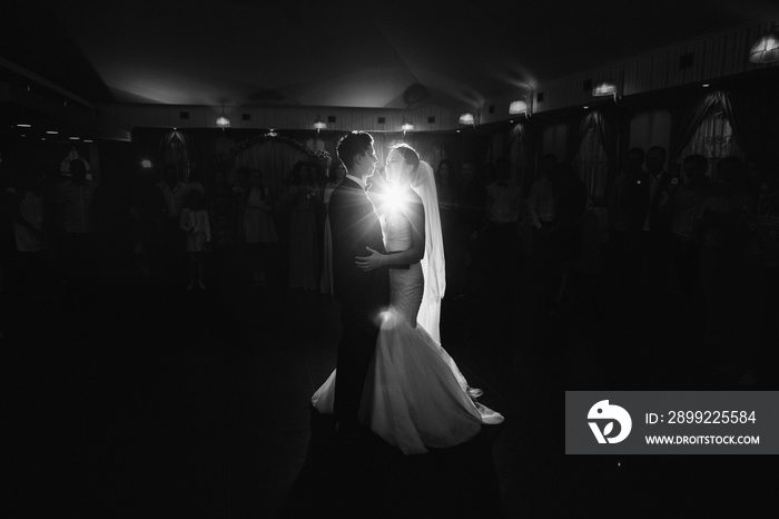 Newlywed couple first dance at ballroom