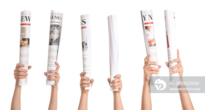 Female hands with newspapers on white background