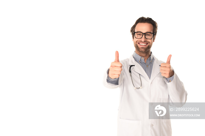 Smiling doctor showing thumbs up isolated on white