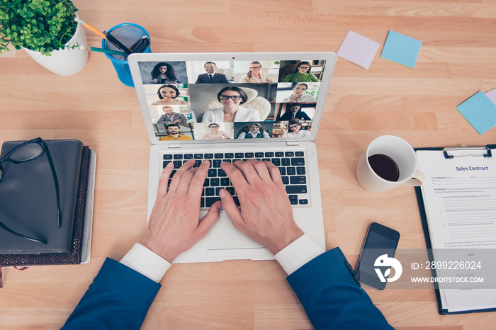 Using modern technology lifestyle holding seminar workshop by employer boss concept. Top above pov first person view photo of professional guy in suit type common message to team looking at monitor