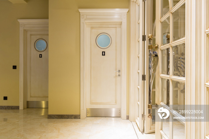 Public toilet doors in hotel restaurant