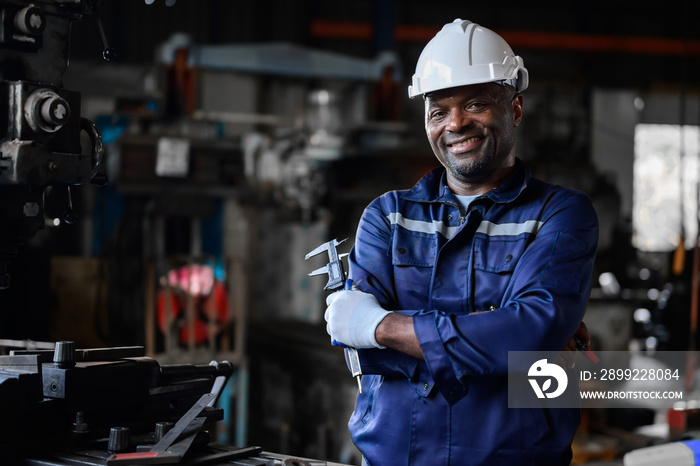 Professional worker of manufacturing plant factory. Engineer working with machine Maintenance machine, mechanical engineering portrait working teamwork.