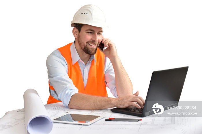 Architect / engineer at his desk planning the construction of a house - white background