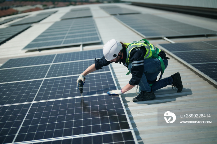 Professional worker installing solar panels on the roof. engineer working on checking equipment in solar power plant, Pure energy, Renewable energy.