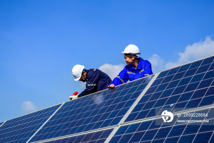 Solar panel, Worker installation Solar panel at solar energy farm field