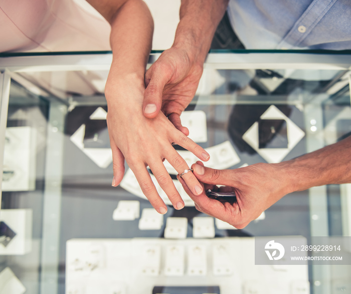 Couple buying wedding ring