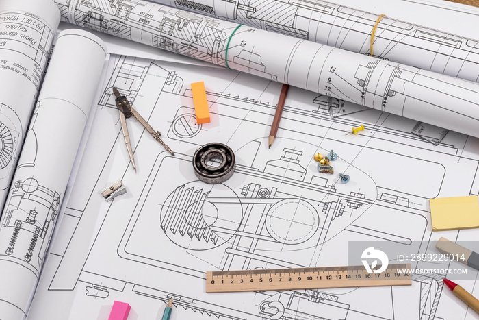 Workplace - technical project drawing with engineering tools. Construction background.