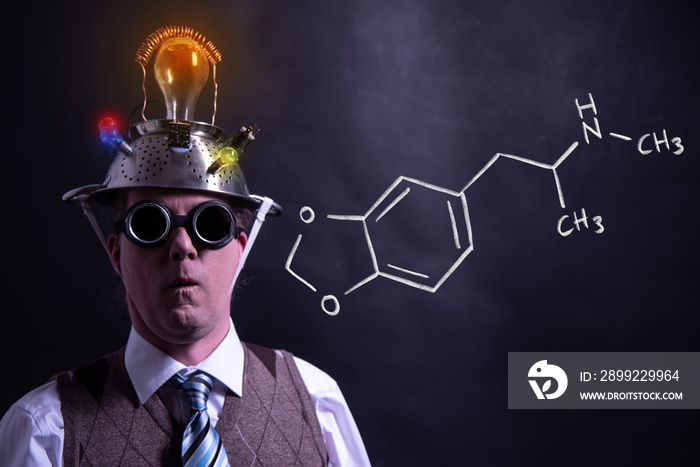 Nerd presenting handdrawn chemical formula of MDMA ecstasy