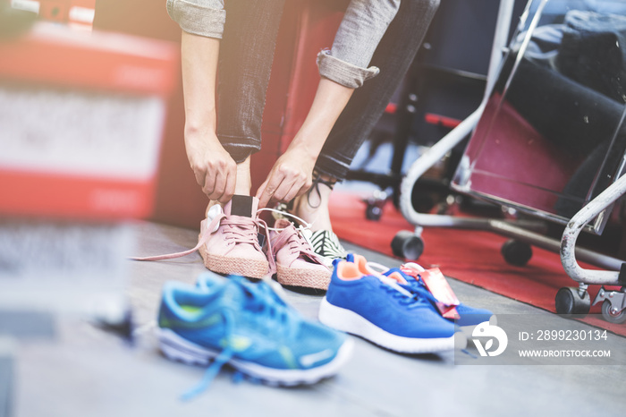 Woman trying shoes in store