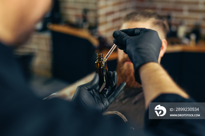 Oil for care and growth of beard, barbershop.