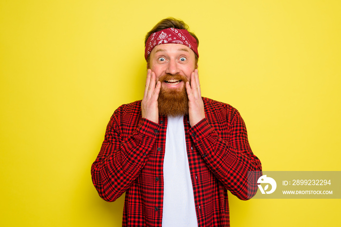 Wondered man with beard and bandana in head