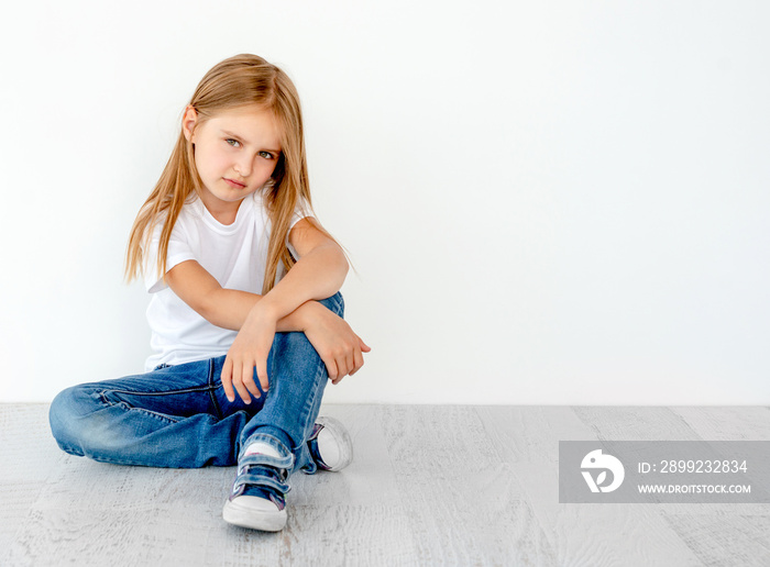 Little cute girl on the floor, smiling