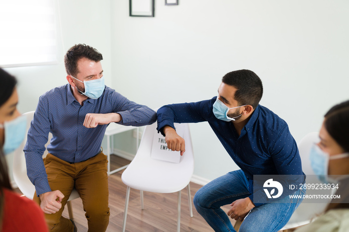 Handsome men meeting at counseling during the pandemic