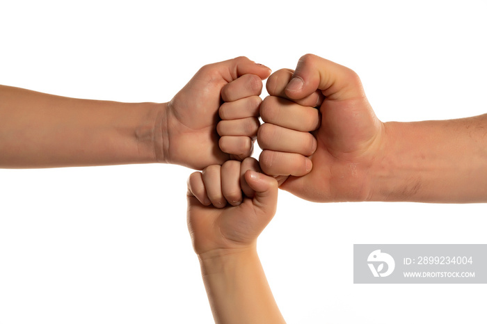 Family hands in different generation Giving Fist Bump. Successful business teamwork with hands gesture communication. Family partnership family work together harmony, trust concept