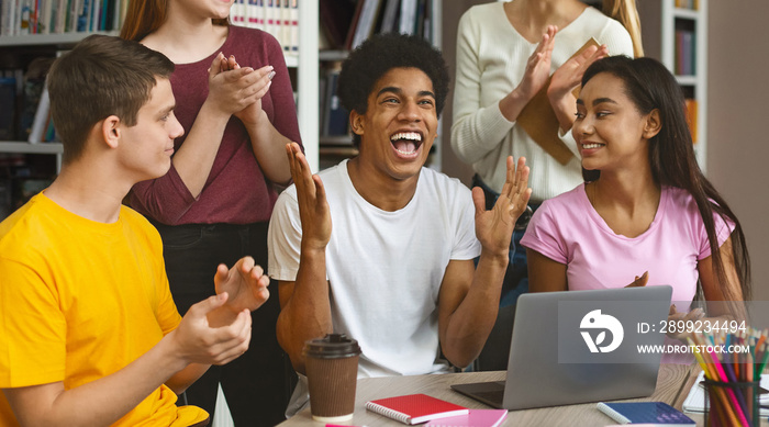 African american guy celebrating high exam results