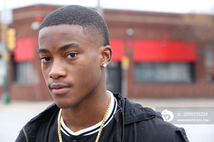 Portrait of a young African American male model in a urban setting