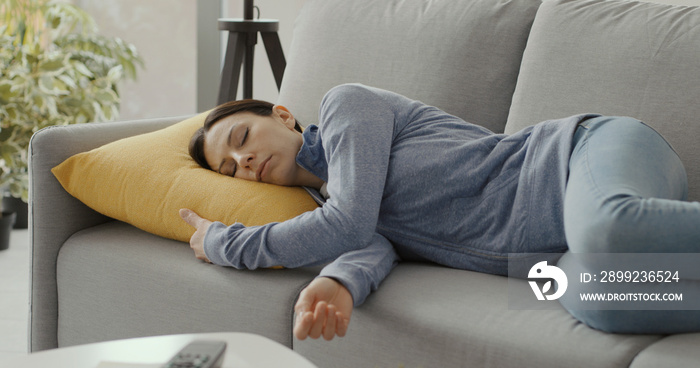 Woman resting on the couch at home