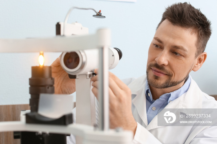 Portrait of male ophthalmologist in clinic